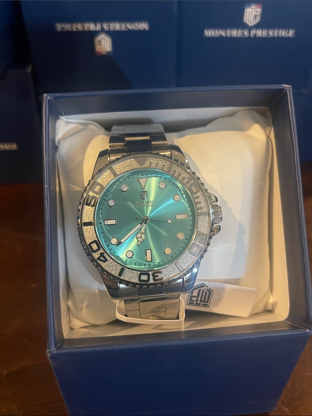 Invicta Silver Stainless Steel Watch with Turquoise Dial MPW-0396